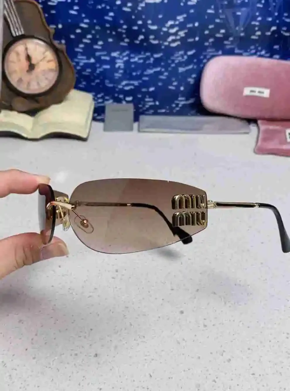 Miu Miu Rimless Gradient Brown Lens Gold Logo Sunglasses